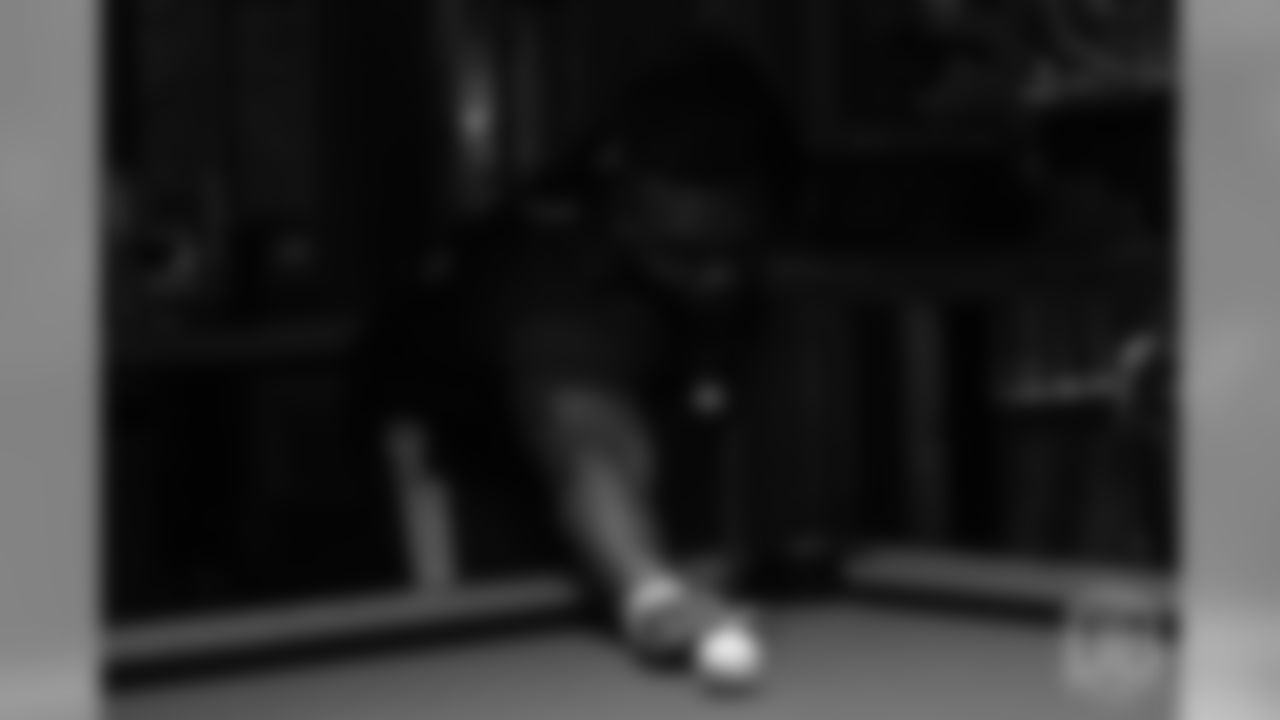 Shaquil Barrett plays pool on the first day of Von Miller's Pass Rush Summit, which included a welcome session and a night of games on June 27, 2018.