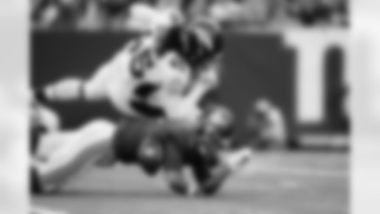Denver Broncos linebacker Alexander Johnson (45) forces a fumble during the NFL game against the New York Giants on Sunday, September 12, 2021 at MetLife Stadium in East Rutherford, New Jersey.
Photo by Joe Faraoni