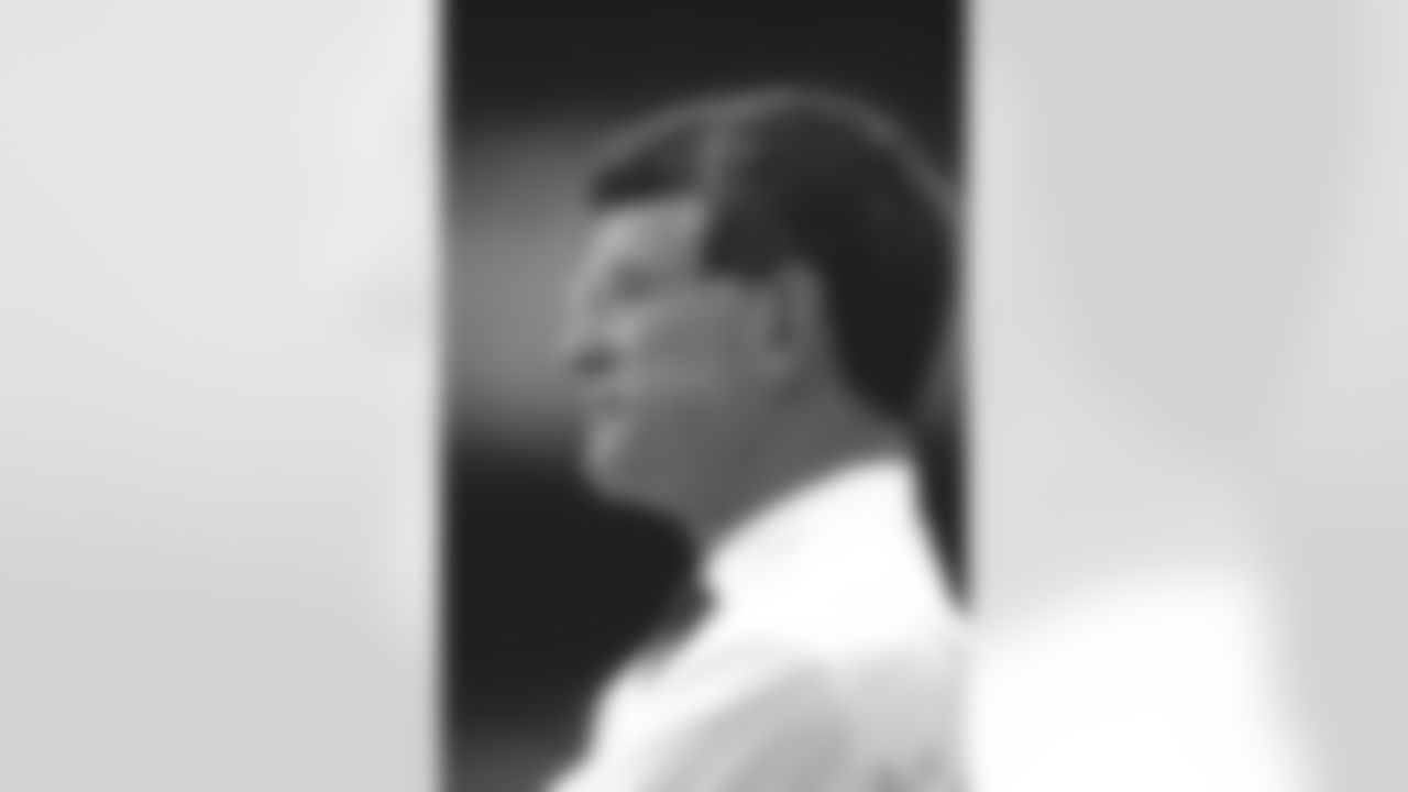 Coach Dan Reeves watches from the sideline during a 1990 game.