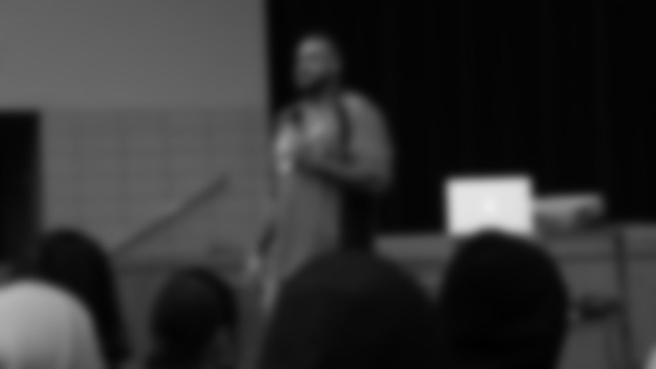 Dalton Risner answers questions at North Middle School in Aurora, Colorado for a Character Playbook School Service event on December 9, 2019. (Photo by Emily Simanskis)