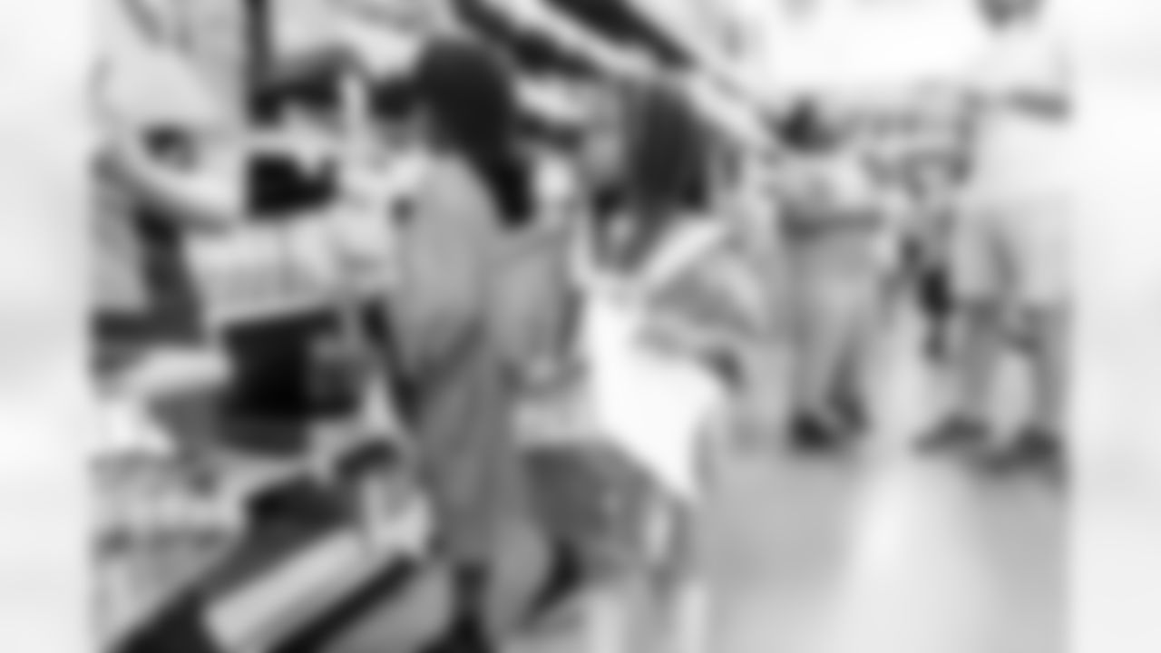 Denver Broncos Cheerleaders and Broncos alumni help children go back-to-school shopping at King Soopers Marketplace in Parker, Colorado on July 26, 2022. (Photo by Joe Abdellah)