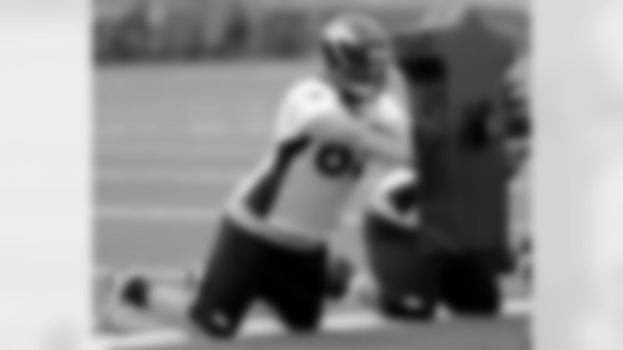 DL Ben Garland focuses on his hand placement.
