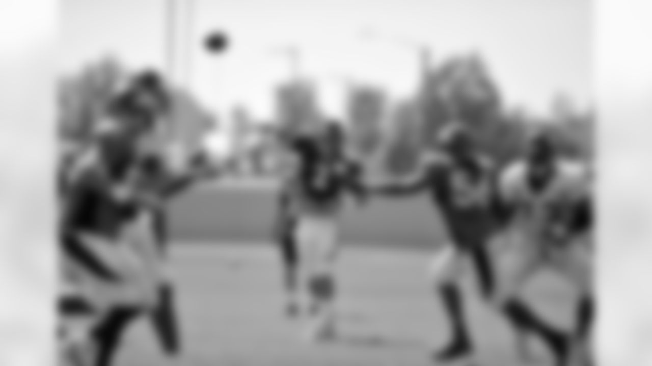 QB Adam Weber delivers a pass.