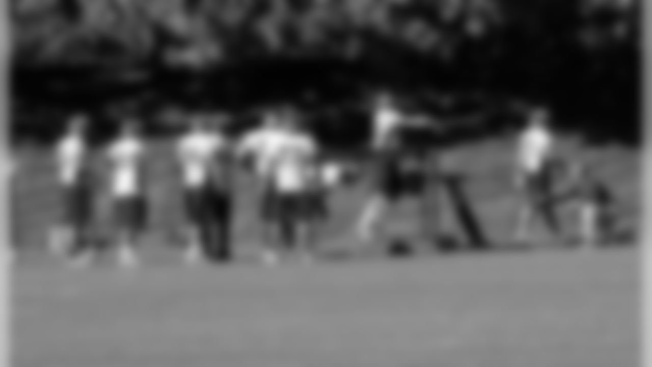The D-Line works on footwork and reaction during position drills.