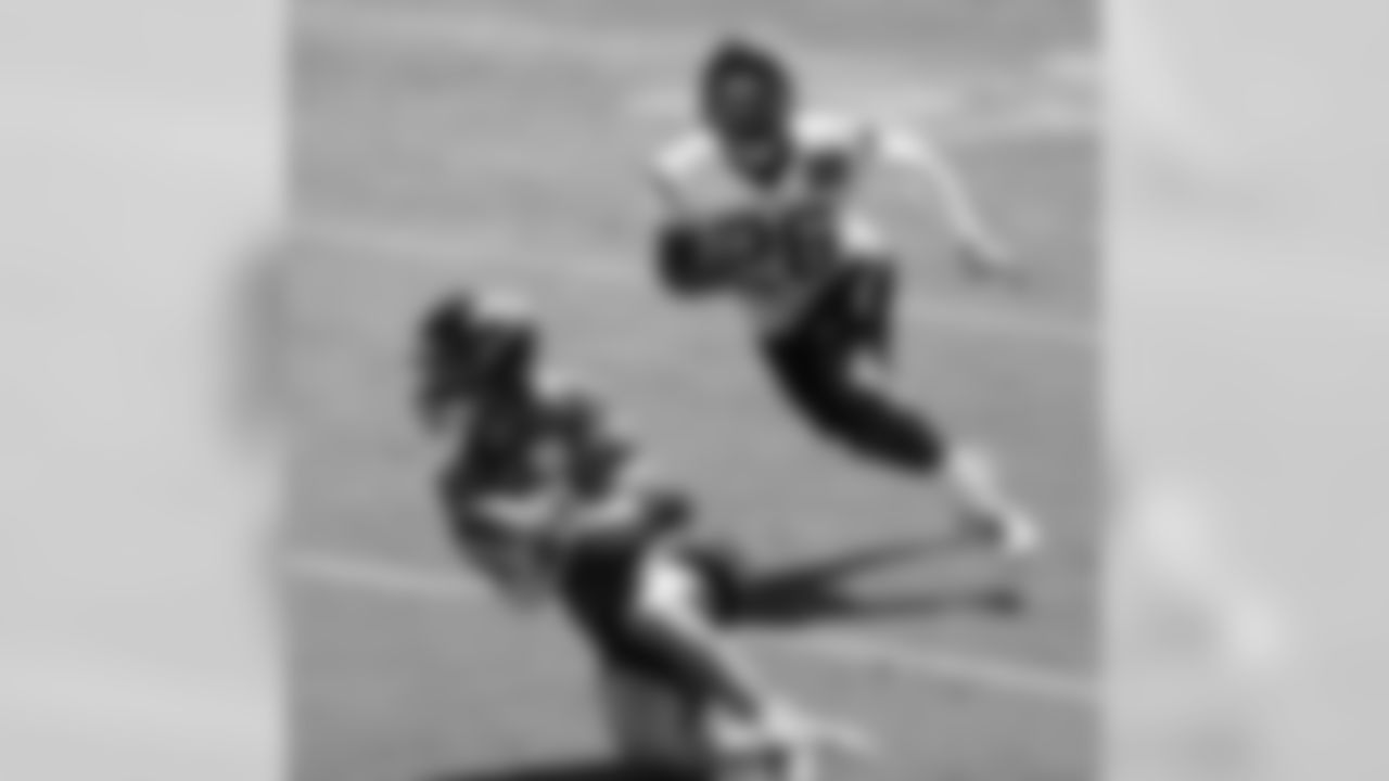 WR Wes Welker and CB Brandon Harris