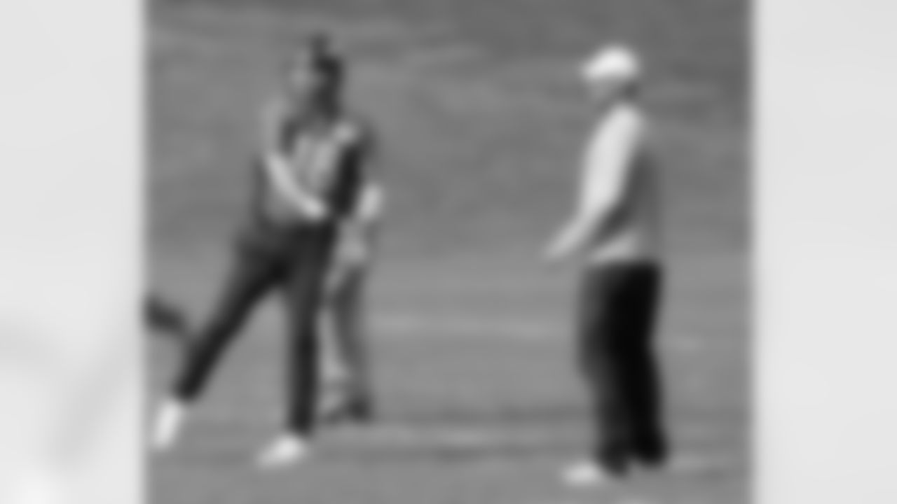 Peyton Manning and Adam Gase