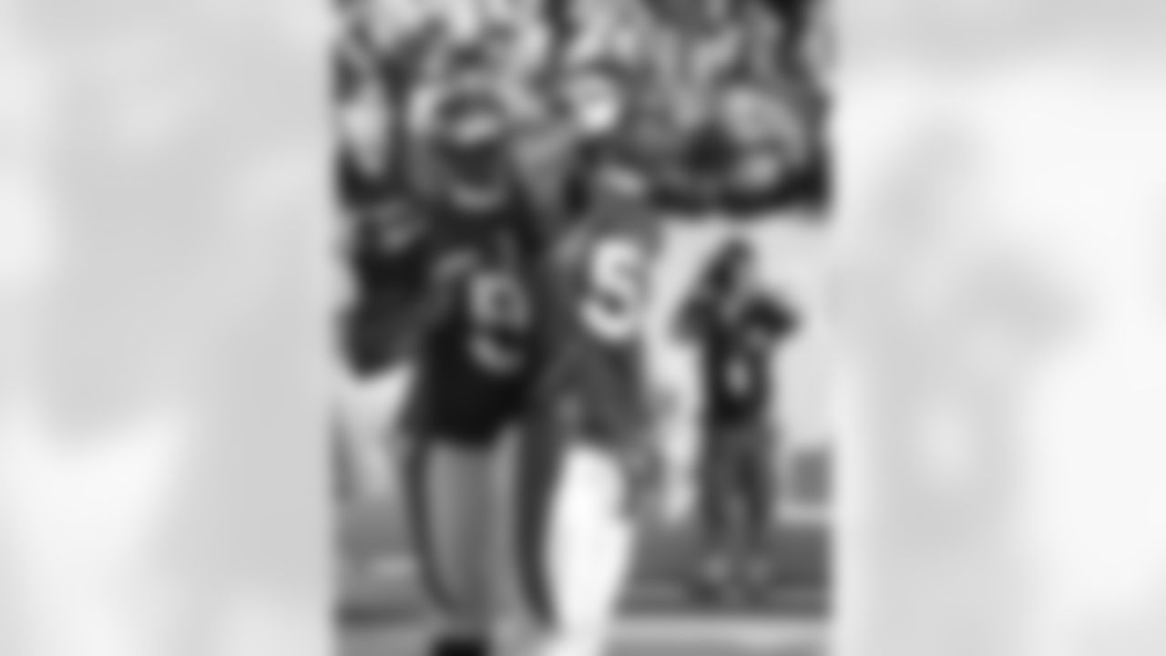 Denver Broncos Von Miller (58) salutes the fans after producing a sack for a 13-yard loss in fourth quarter action against the Cincinnati Bengals in the NFL game September 18, 2011 at Sports Authority Field at Mile High in Denver,CO.
