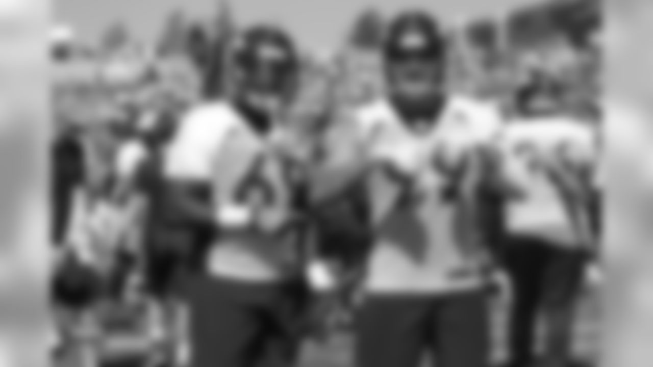 Defensive end Antonio Simmons (69) and defensive end Adam Gotsis (99), both former Georgia Tech Yellow Jackets, during the 11th day of training camp on August 9, 2018, at UCHealth Training Center.