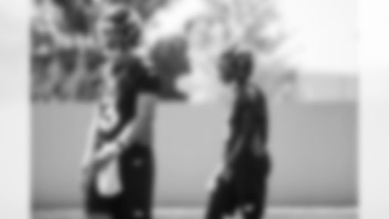 Drew Lock and Teddy Bridgewater during a training camp practice for early reports (rookies, quarterbacks and select veterans) at UCHealth Training Center on July 25, 2021. (Photo by Ben Swanson)
