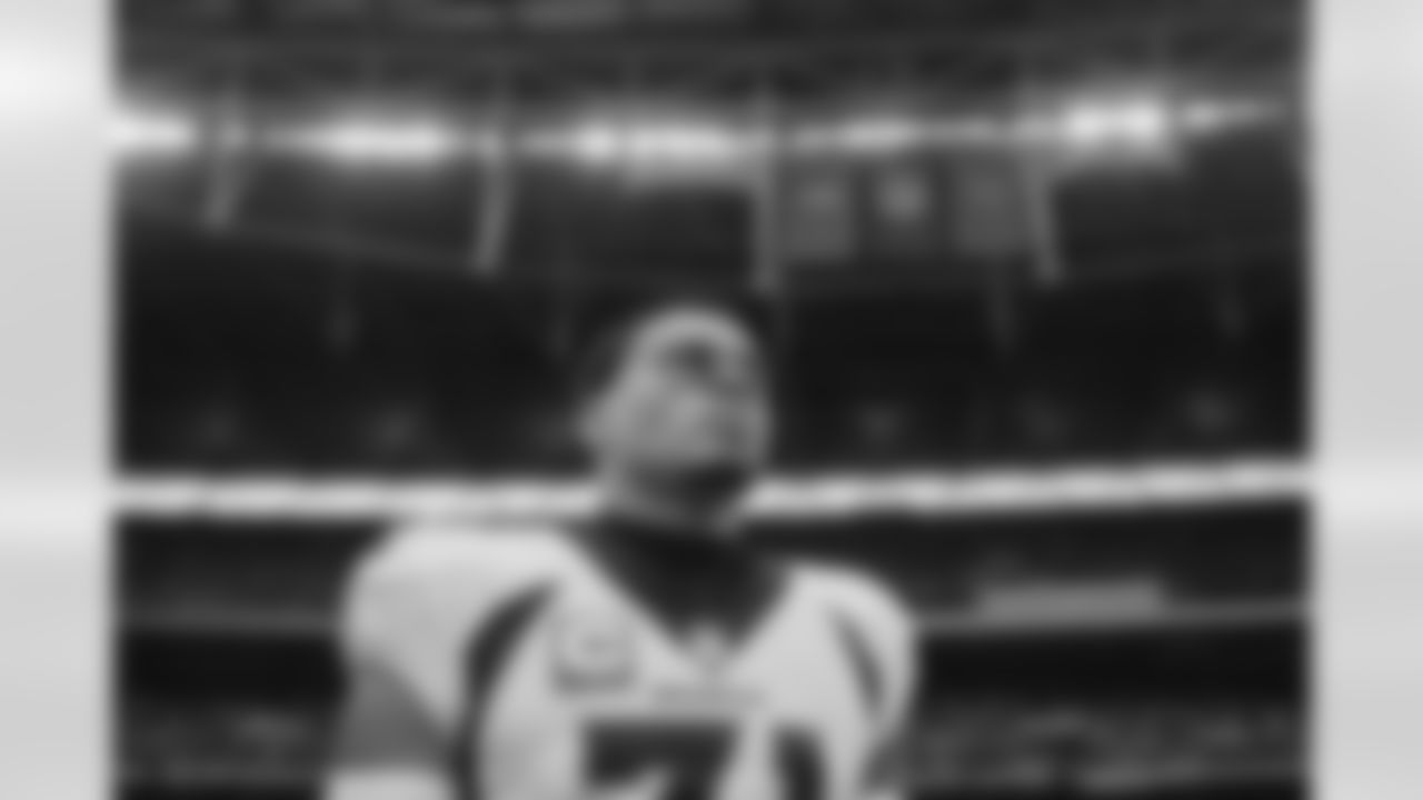 Justin Simmons during the national anthem before the Broncos' Week 8 game against the Jaguars at Wembley Stadium in London on October 30, 2022. This image is part of the Broncos' film series documenting the team's trip to London. (Photo by Ben Swanson)