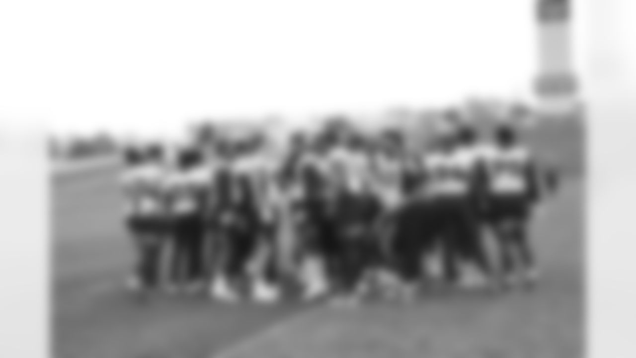 Members of the defense huddle up during an Offseason Program workout at UCHealth Training Center in Centennial, CO, May 17, 2021.
Photo by Gabriel Christus