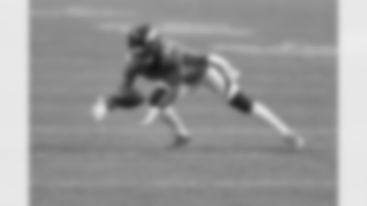 Denver Broncos safety Kareem Jackson (22) picks up a loose ball oafter a fumble during the NFL game against the Las Vegas Raiders at Empower Field at Mile High in Denver, Colorado, January 03, 2021.
Photo by Gabriel Christus