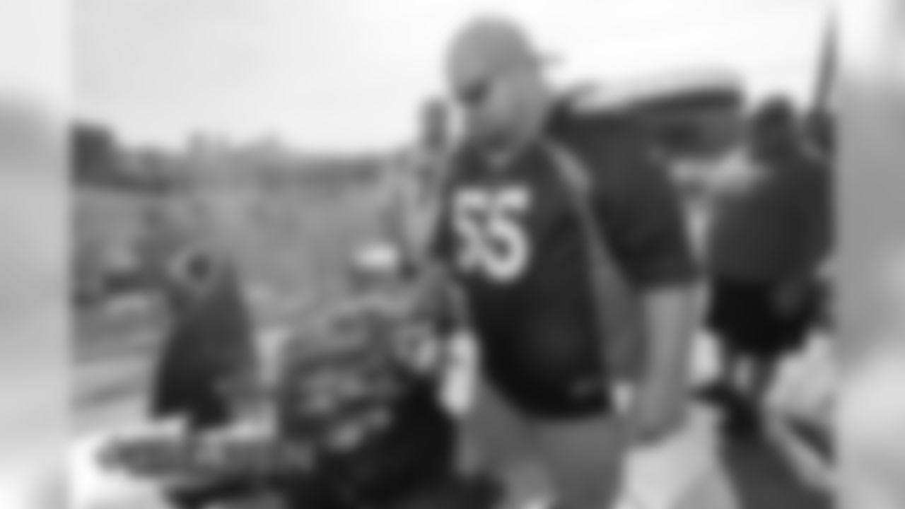 Denver Broncos fan Aaron Alexander tailgates prior to an NFL football game against the Chicago Bears, Sunday, Sept. 15, 2019, in Denver. (AP Photo/David Zalubowski)