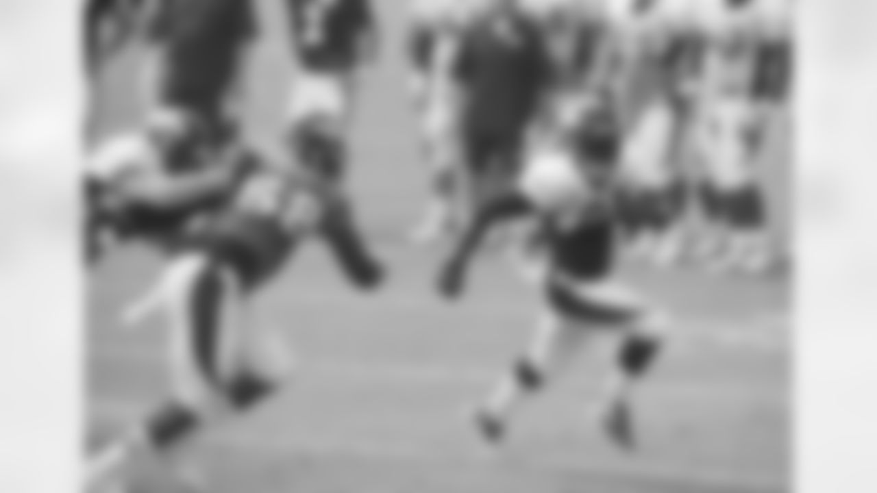 Hillman looks for the edge with Miller in pursuit.