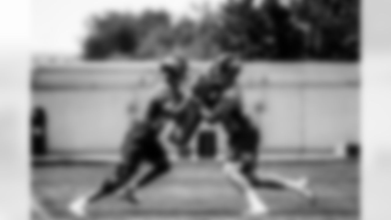 Albert Okwuegbunam and Shaun Beyer during the 10th day of OTA practices at UCHealth Training Center on June 10, 2021. (Photo by Ben Swanson)