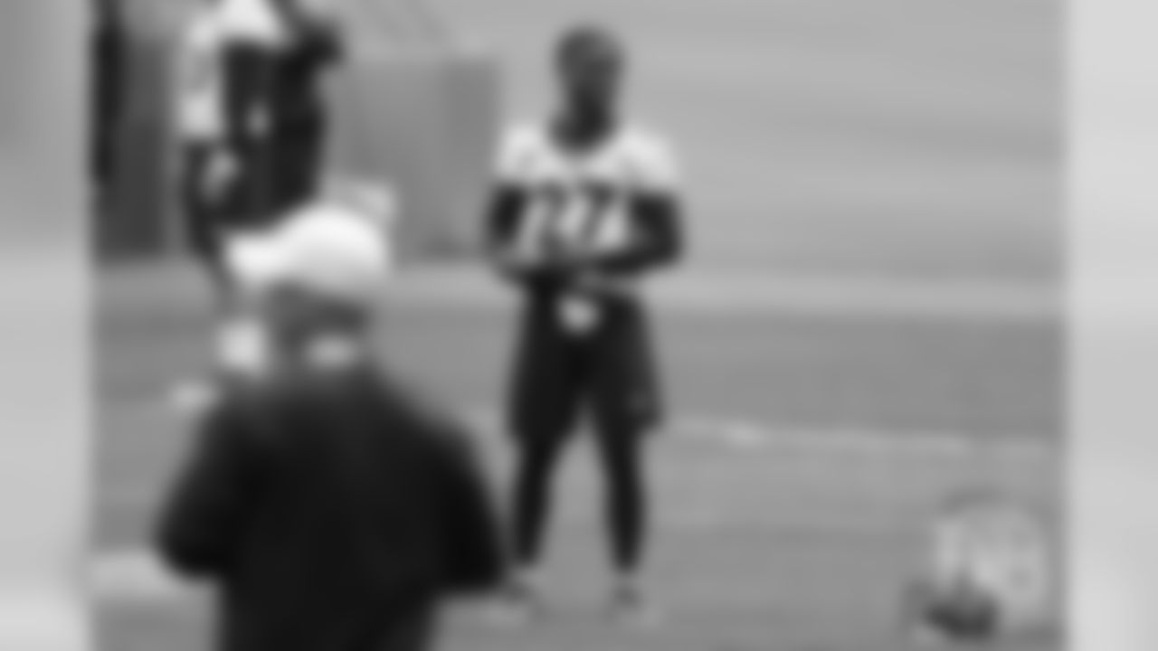 Cornerback Horace Richardson prepares to stretch before the first day of voluntary veteran minicamp on April 16, 2019.