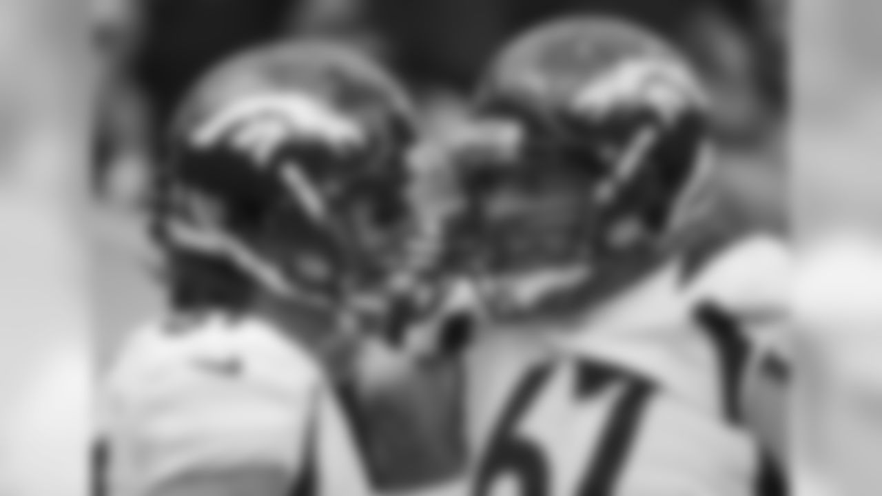 Decker celebrates his touchdown with center Dan Koppen.