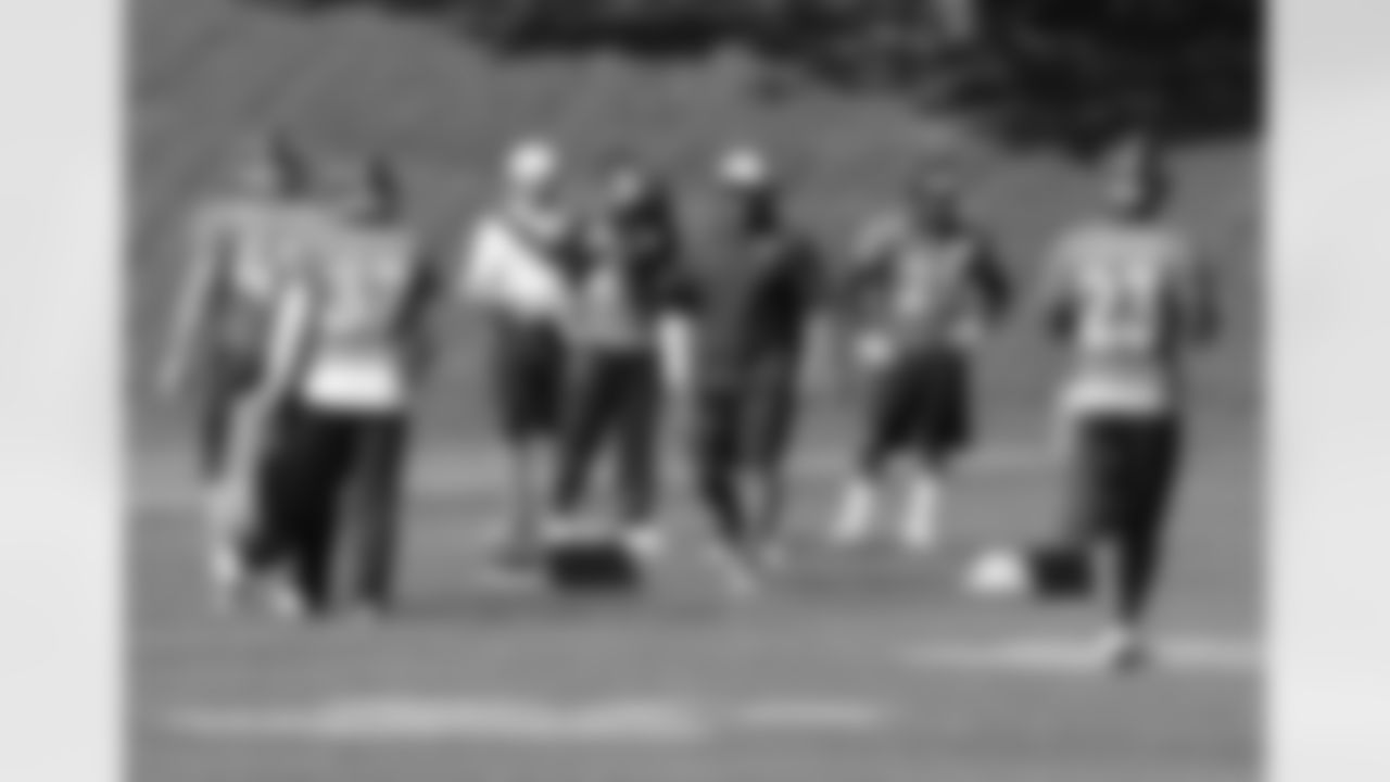 Running Backs Coach Eric Studesville instructs the backs.