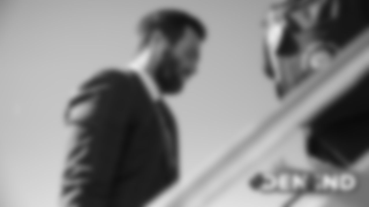 Joe Flacco on the tarmac at Denver International Airport during the team's travel to Indiana on October 26, 2019 ahead of their Week 8 game against the Indianapolis Colts. (Photo by Ben Swanson)