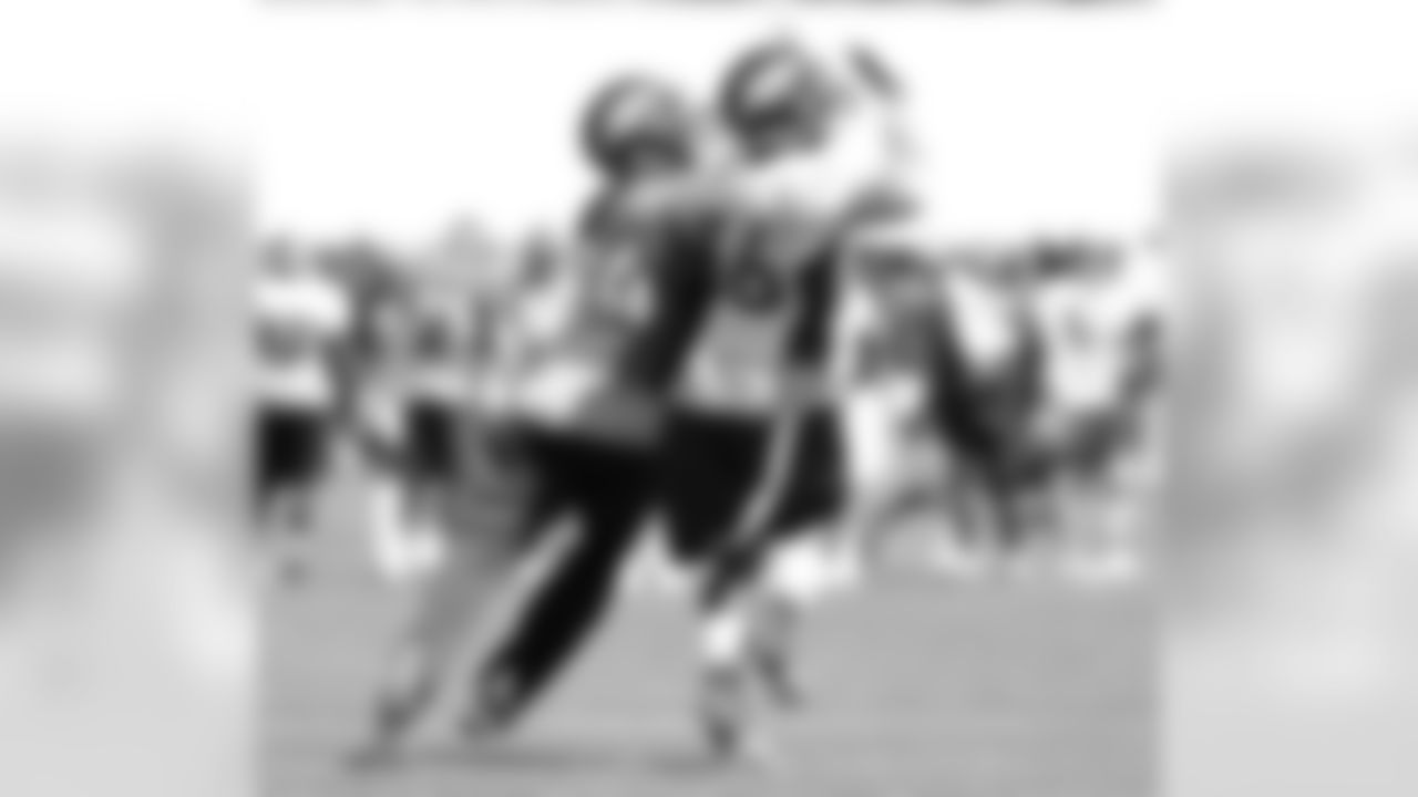 Webster knocks a pass away from Tamme.