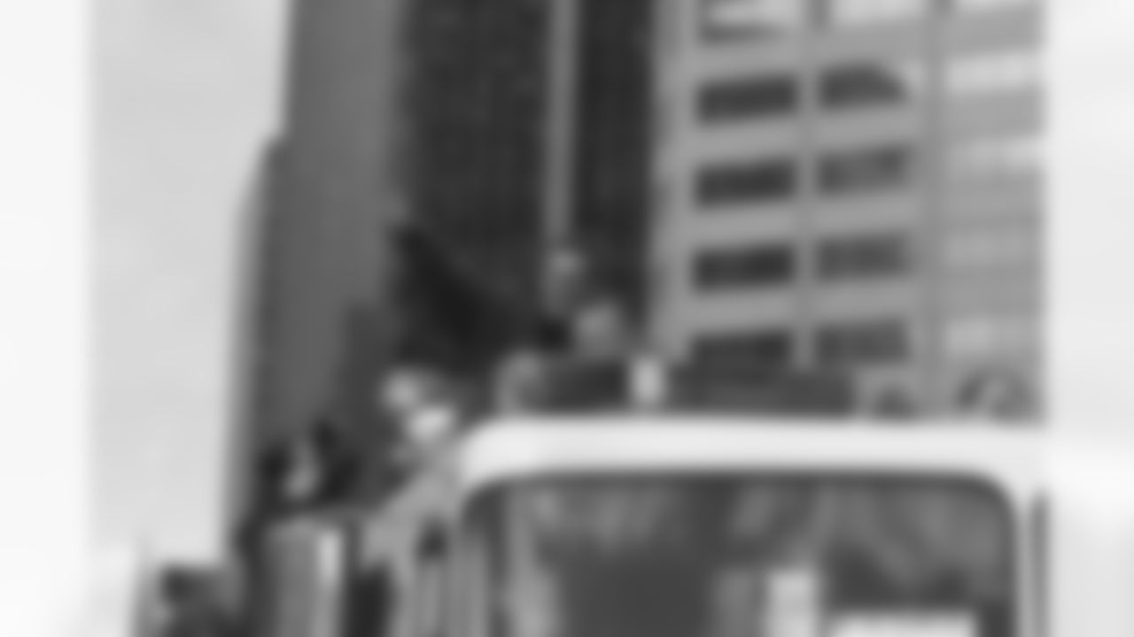 An estimated 350,000 fans turned out in downtown Denver and then on to City Hall to catch a glimpse of their back-to-back World Champion Broncos. Here Mike Shanahan waves to the crowd.