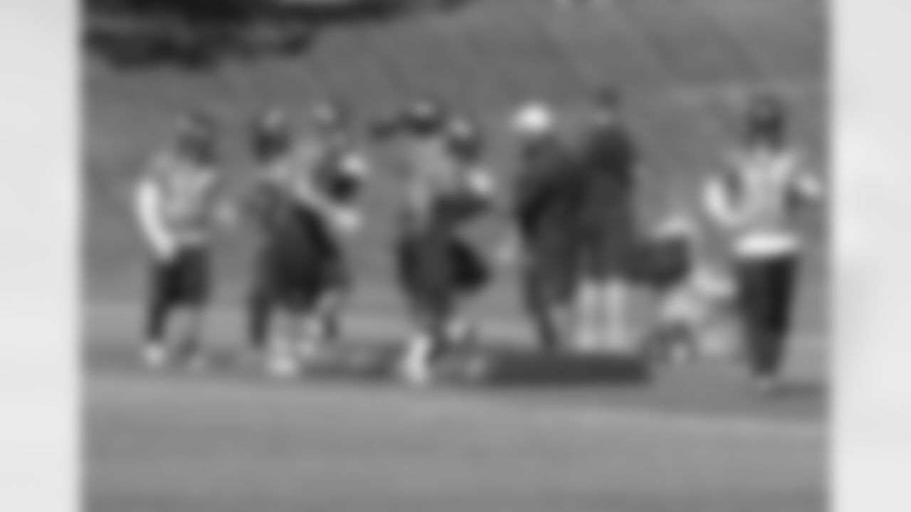 RB Coach Eric Studesville leads a running backs drill.