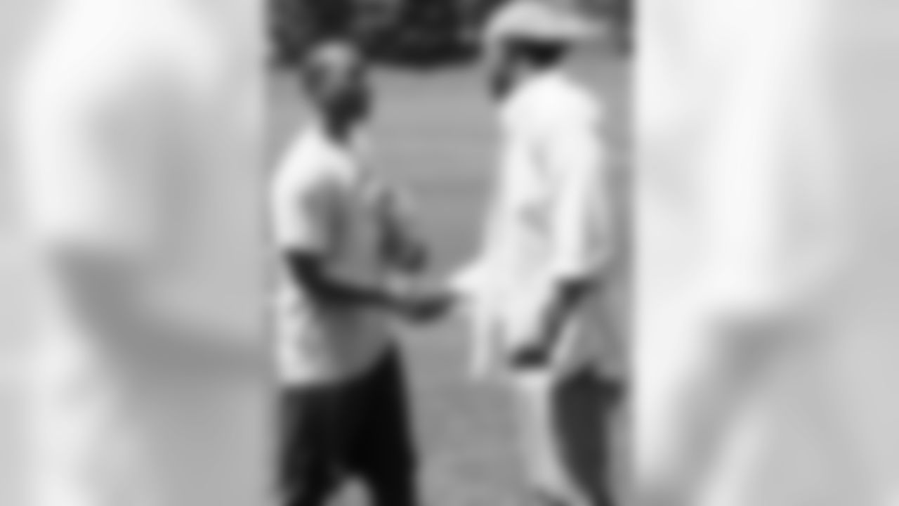Dawkins meets cornerback Ramzee Robinson.