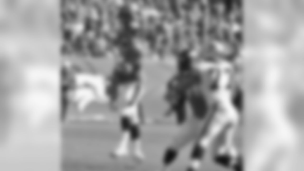 QB Peyton Manning gets off a pass during the first half against the Oakland Raiders.