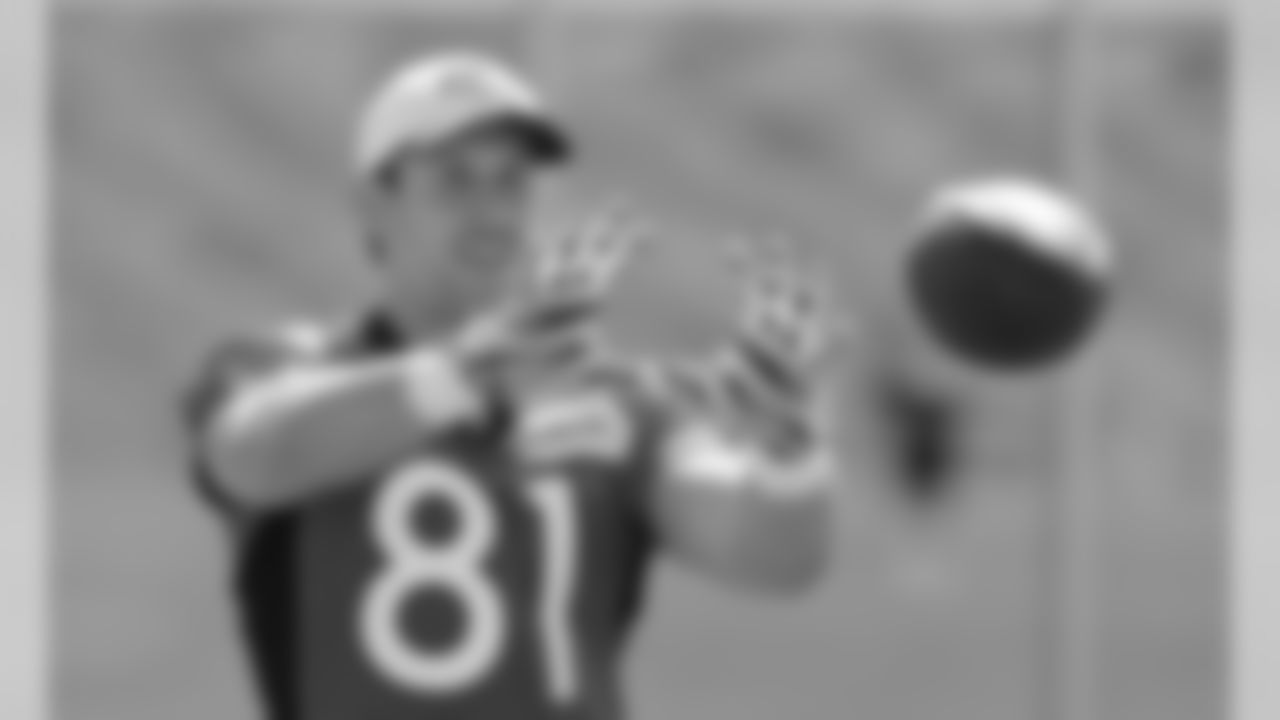 Tight end Owen Daniels catches passes during drills on the second day of voluntary vet minicamp.