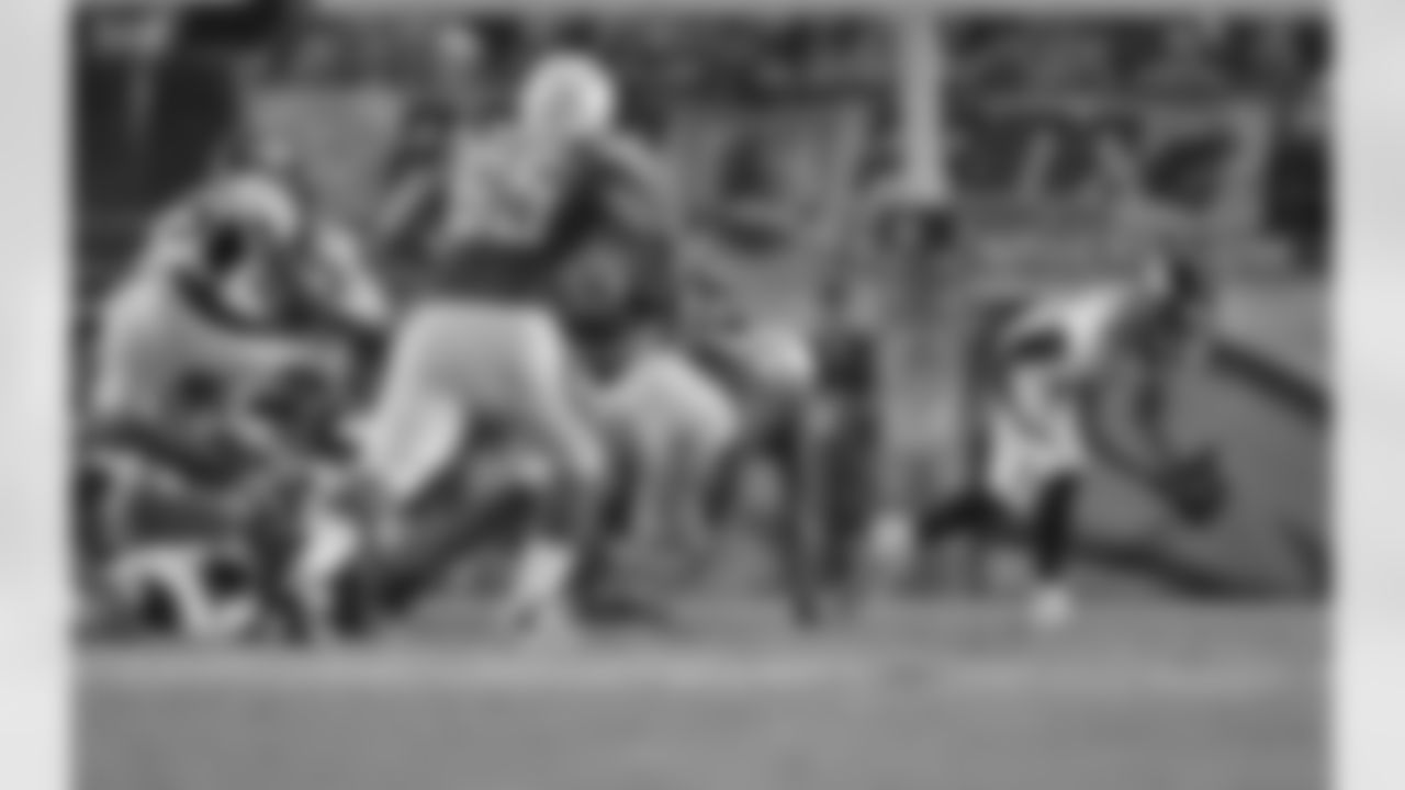 CB Tony Carter scoops up the fumble and is off to the races.