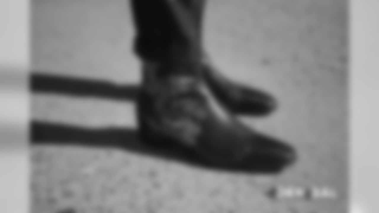 A close-up view of Demaryius Thomas' boots as he walks to the plane on the tarmac at Denver International Airport during the team's travel for their Week 3 game against the Baltimore Ravens on September 22, 2018.