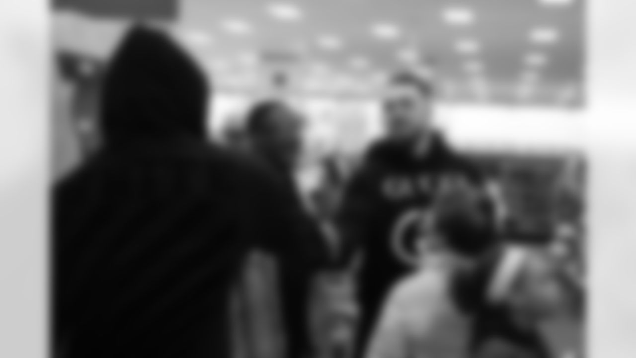 Derek Wolfe and Will Parks at a holiday shopping spree hosted by Will Parks for children from the Boys & Girls Clubs of Metro Denver on December 3, 2018.