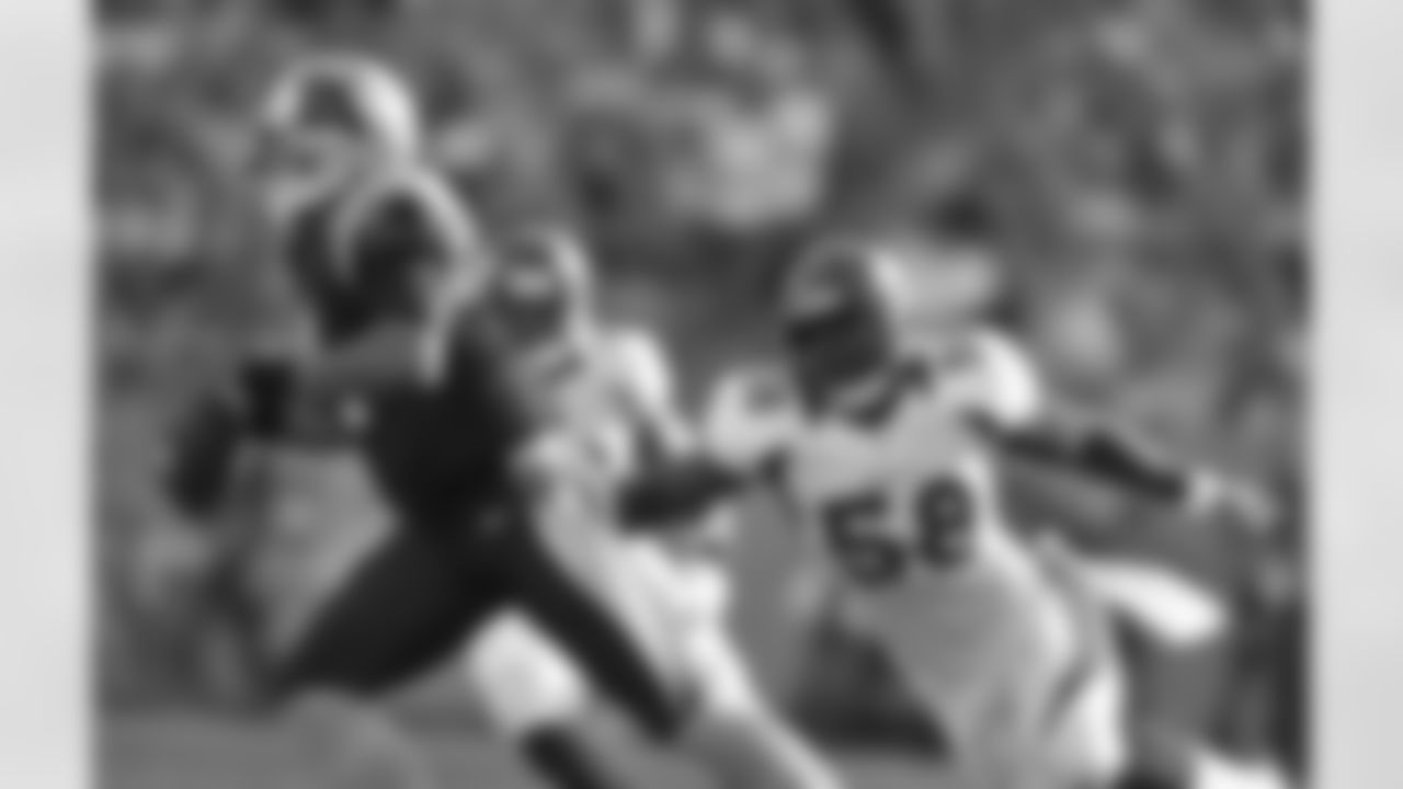 LB Von Miller chases down Panthers QB Cam Newton.