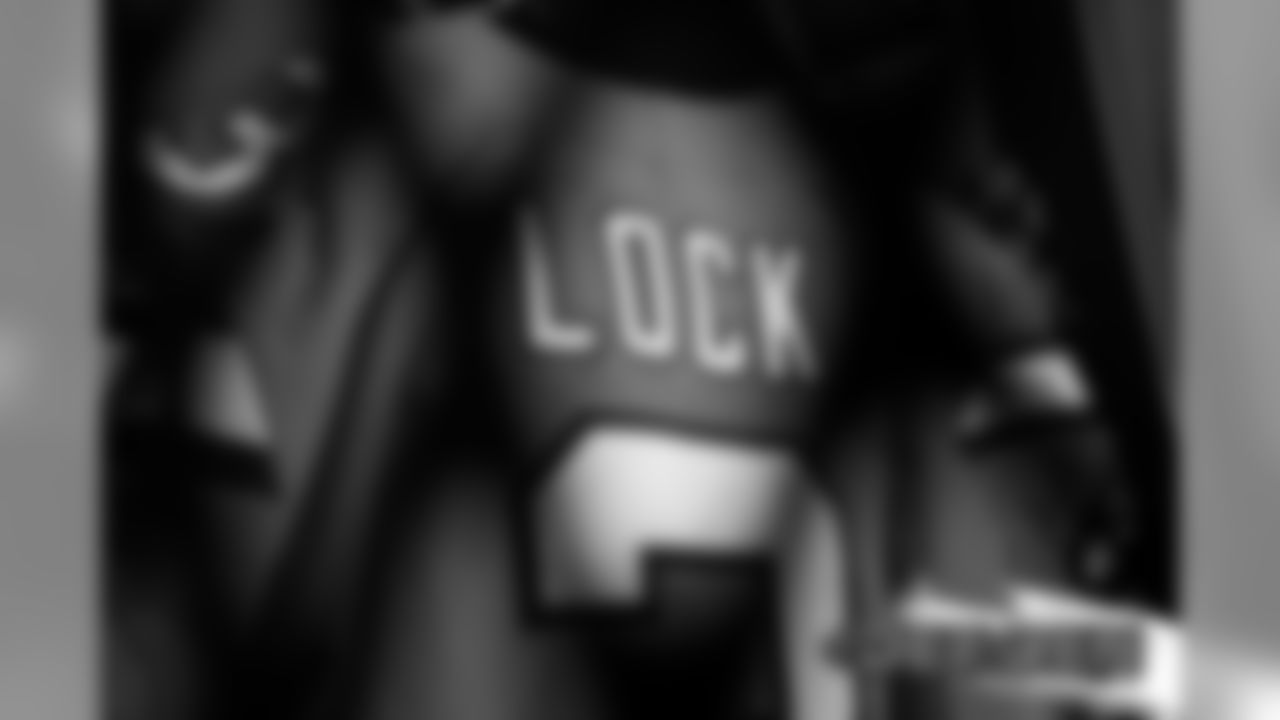 A preview of Drew Lock's Color Rush jersey during a photoshoot ahead of the team's Week 16 game against the Lions on December 18, 2019 at UCHealth Training Center. (Photo by Ben Swanson)
