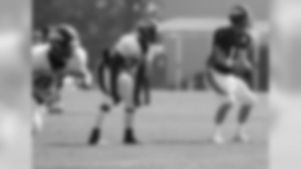 Manning takes the snap with Montee Ball lined up at RB.