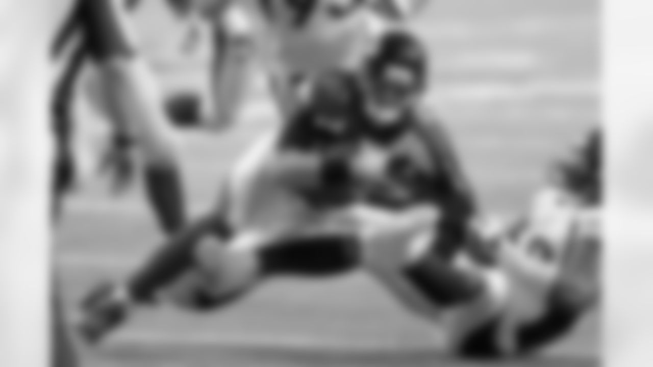 Miller drags down Matt Ryan for an 11-yard sack in the fourth quarter.
