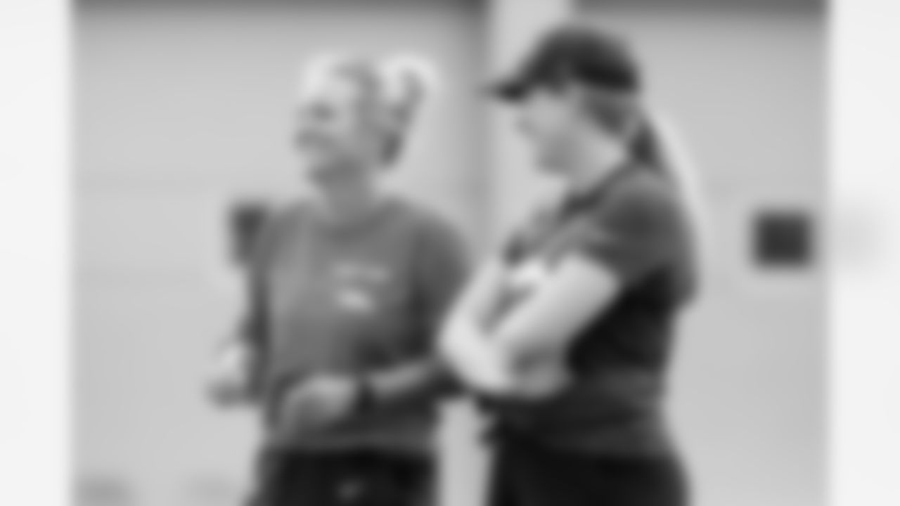 Executive Director of Football Operations/Special Advisor to the General Manager Kelly Kleine and Senior Vice President of Strategy Brittany Bowlen during practice on the sixth day of training camp at UCHealth Training Center on August 3, 2021. (Photo by Ben Swanson)
