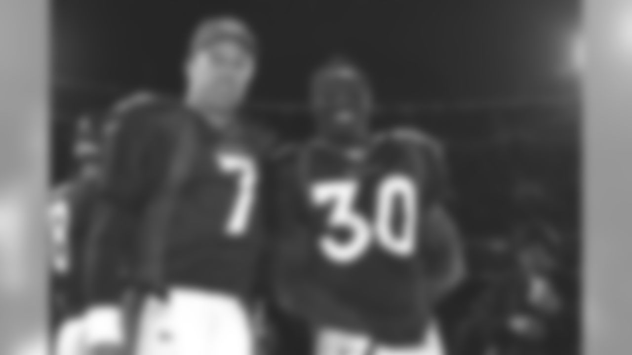 John Elway and Terrell Davis were all smiles after their record-breaking season, capped by a win against the Seattle Seahawks at Mile High Stadium in Denver, CO on December 27, 1998.