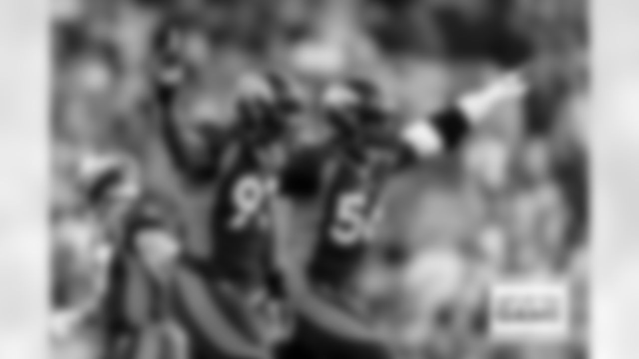 Denver Broncos linebacker Baron Browning (56) and defensive end Dre'Mont Jones (93) celebrate after a sack during a NFL game against the Kansas City Chiefs on Sunday, December 11, 2022 at Empower Field at Mile High in Denver, Colorado.
Photo by Gabriel Christus / Denver Broncos