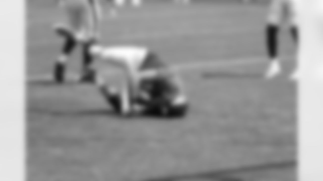 Tamme goes to the ground after grabbing a touchdown during red zone drills.