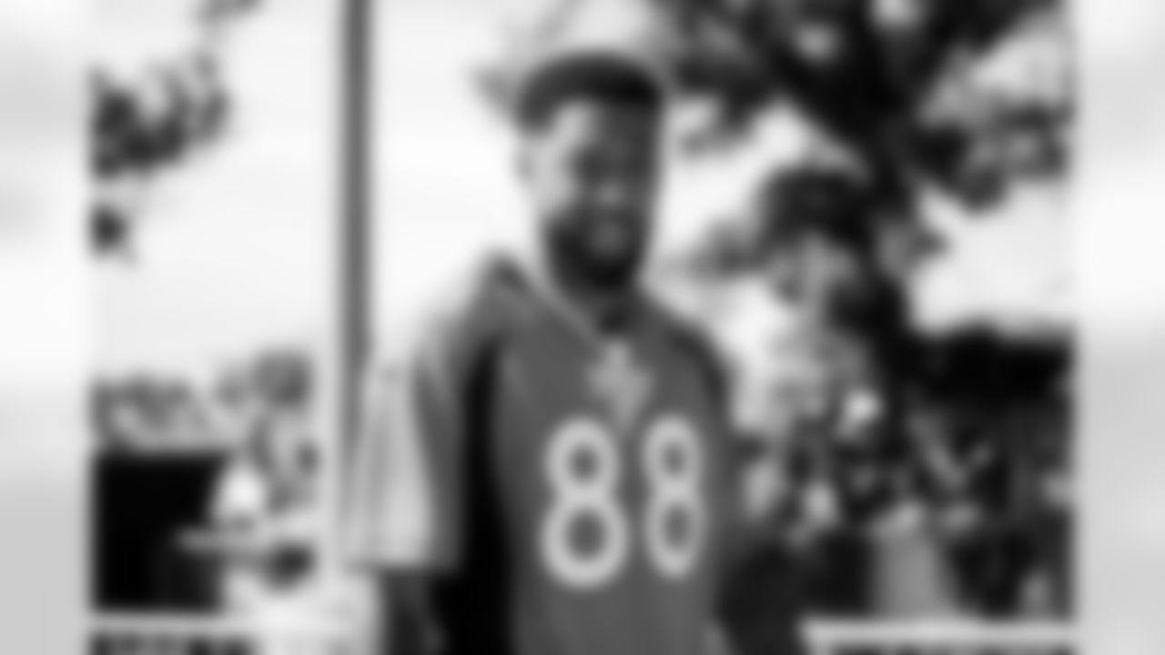Tim Patrick wears a Demaryius Thomas jersey as he arrives at the stadium before the Broncos' Week 3 game against the New York Jets at Empower Field at Mile High in Denver, Colorado on September 26, 2021. (Photo by Ben Swanson)