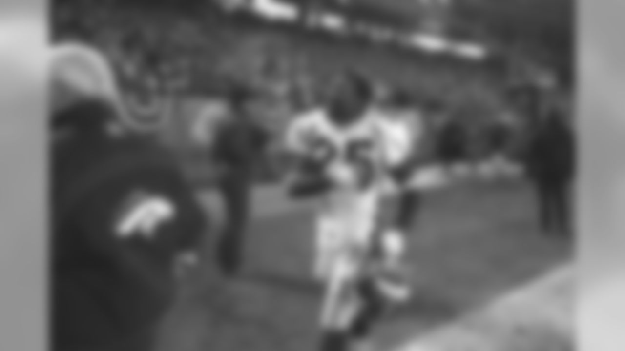 Darrius Johnson leaves Arrowhead stadium with a smile after the Broncos have just saved a last second victory against the Kansas City Chiefs at Arrowhead Stadium in Kansas City on January 4, 1998.
