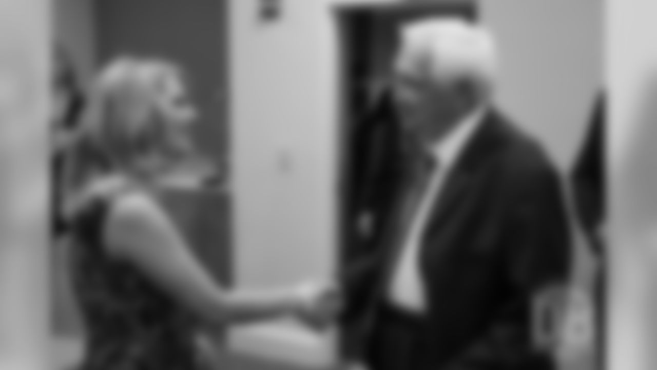 Christianna Bowlen greets Gil Brandt after the announcement of the Pro Football Hall of Fame's Class of 2019 on February 2, 2019.