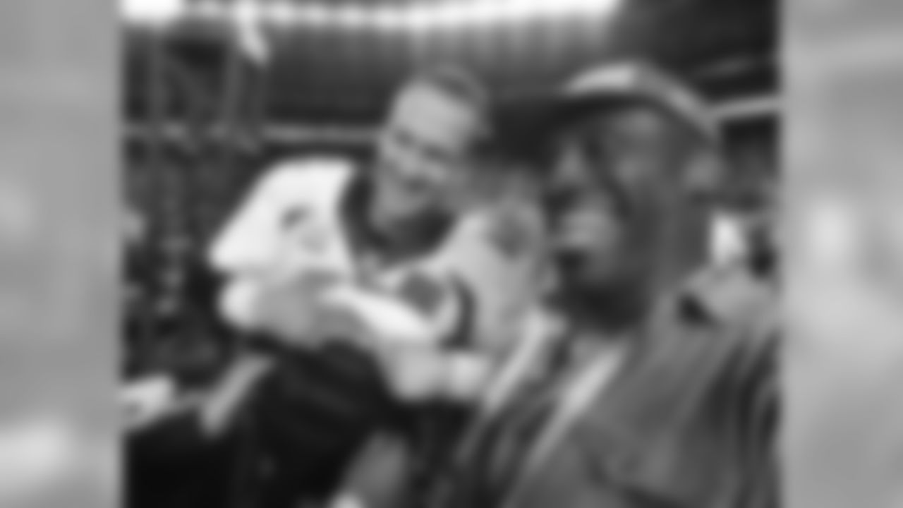 Shannon Sharpe and Peyton Manning pose for a photo together postgame after Denver defeated the Carolina Panthers 24-10 in Super Bowl 50 at Santa Clara, Calif. February 7, 2016 (Photo by Eric Lars Bakke/ Denver Broncos)