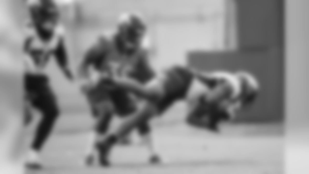 Josh Watson falls to the ground as he wrangles an interception off a deflection during the second training camp practice at UCHealth Training Center on August 16, 2020. (Photo by Ben Swanson)