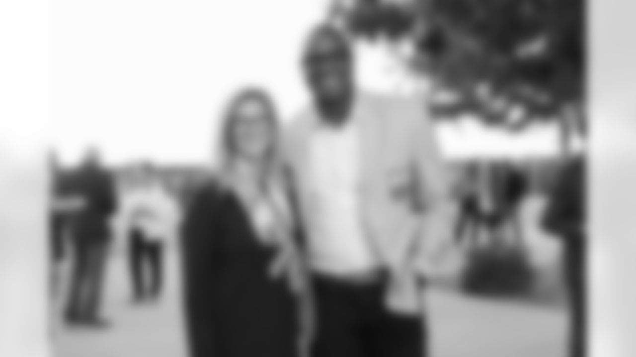 Carrie Walton Penner and DeMarcus Ware during the alumni banquet and reunion celebration at Centura Health Training Center in Englewood, Colorado on September 16, 2023. Photo by Gabriel Christus / Denver Broncos