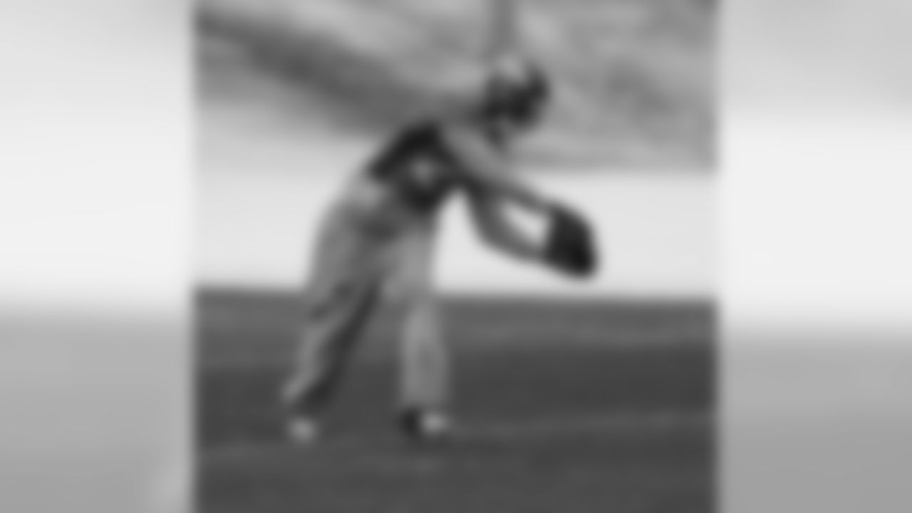 CB Champ Bailey reaches back to pluck a pass out of the air.