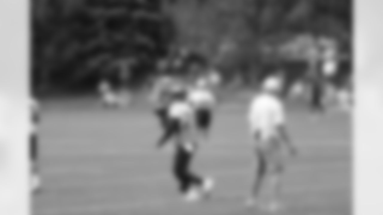 CB Tracy Porter catches the ball during a tip drill.