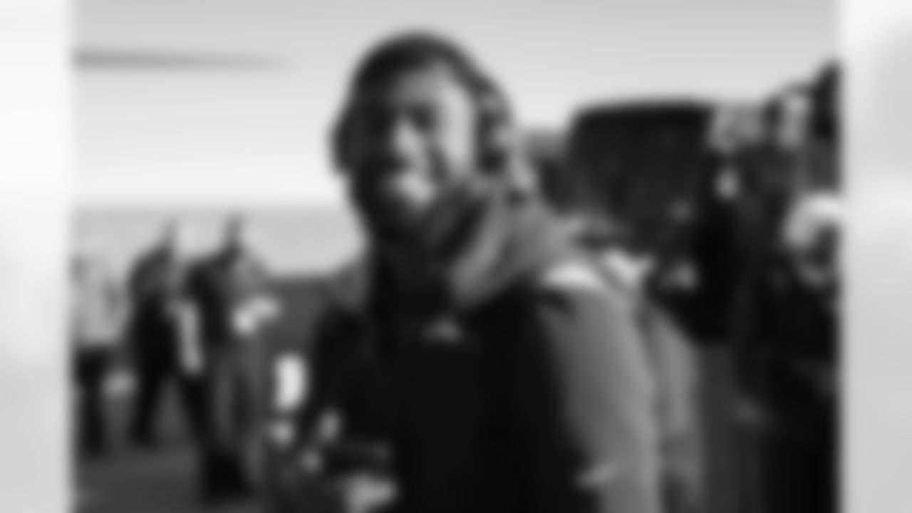 Jonathon Cooper on the tarmac at Denver International Airport on December 4, 2021 during the team's travel to Kansas City in Week 13. (Photo by Joe Abdellah)