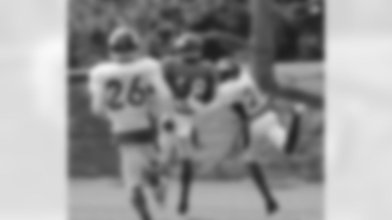 Thomas gets behind Bailey to reel in a deep touchdown pass from Manning.